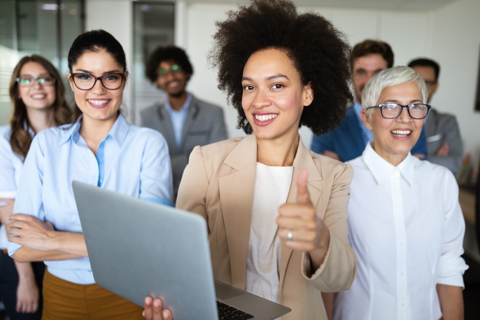 Empowerment program happy-business-people-celebrating-success-at-company (Large)